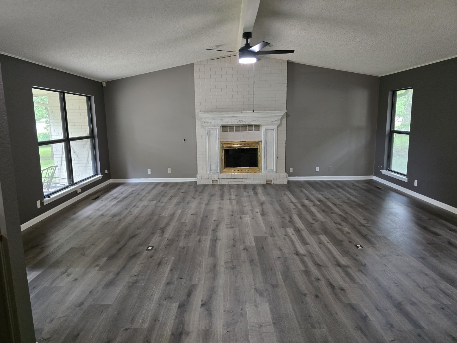 Freshly remodeled living room with new flooring